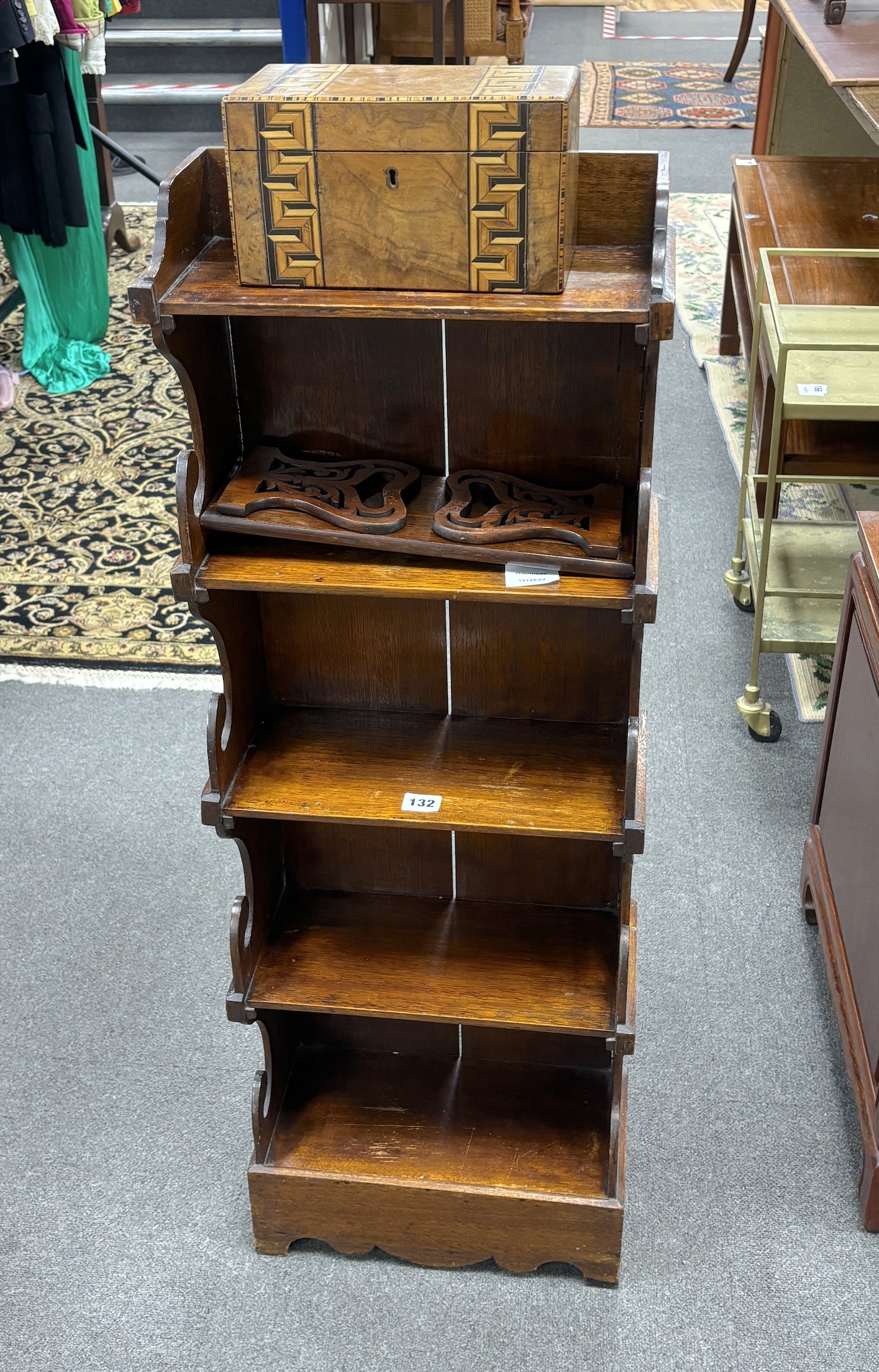 A Victorian style mahogany five tier narrow bookcase, width 36cm, depth 17cm, height 104cm, Victorian parquetry inlaid tea caddy and a Victorian bookslide